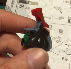 The red piece opens up to reveal some weaponry